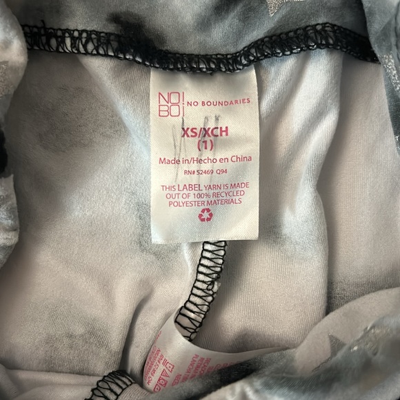 Justice, size xs, and is black white with stars - Picture 3 of 3